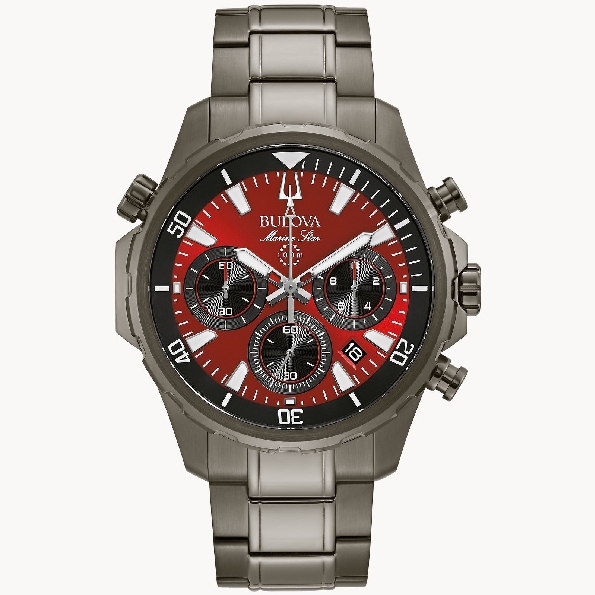 Grey Ion Plated Stainless Steel Case; Six-hand Chronograph Movement; Rotating Dial Ring; Bold Red Dial with Luminous Hands and Markers; Calendar; Flat Mineral Crystal; Grey Ion Plated Stainless Steel Bracelet with Fold-over Buckle from the Marine Sta
