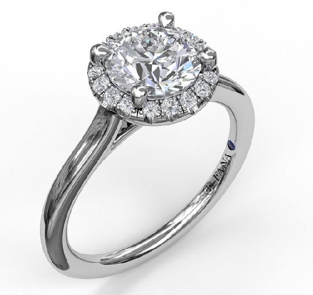 0.14ctw Diamond VS-SI Clarity; FG Colour Round Halo with Bezel Set accent Diamonds set with Cushion Cubic Zirconia and Blue Sapphire Signature Stone 14K White Gold Ring Mount by Fana