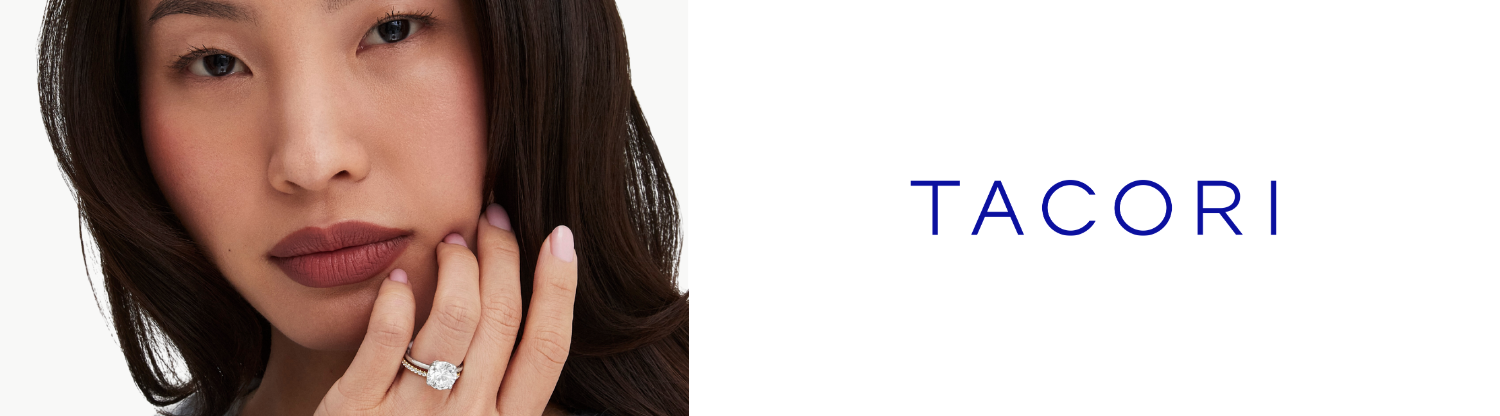 Image of a womans face, her hand is held in front of her face displaying a ring. Next to the text logo Tacori