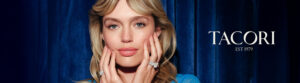 woman holding hands up to her face with Tacori diamond rings on each hand's ring finger